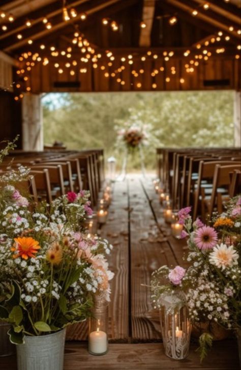 Rustic elegant barn wedding ceremony with wild flowers Rustic Wedding Wild Flowers, Spring Wedding Rustic Decor, Rustic Floral Wedding Decor, Wildflower Wedding Ceremony Decor, Boho Wedding Ceremony Seating, Outdoor Spring Wedding Ideas Rustic, Whimsical Country Wedding, Wedding Aesthetic Country, Spring Rustic Wedding Ideas