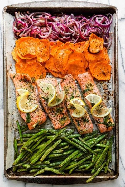 When you’re short on time and dinner ideas, this Sheet Pan Baked Salmon with Vegetables is fast, balanced, and delicious! Made with omega-packed salmon, sweet potatoes, and fresh veggies, this salmon sheet pan dinner comes together in under an hour. Real Food Dietitians, Salmon And Sweet Potato, Oven Baked Salmon, Baked Veggies, Healthy Salmon Recipes, Healthy Salmon, Pan Dinners, Baked Salmon Recipes, Pan Recipes