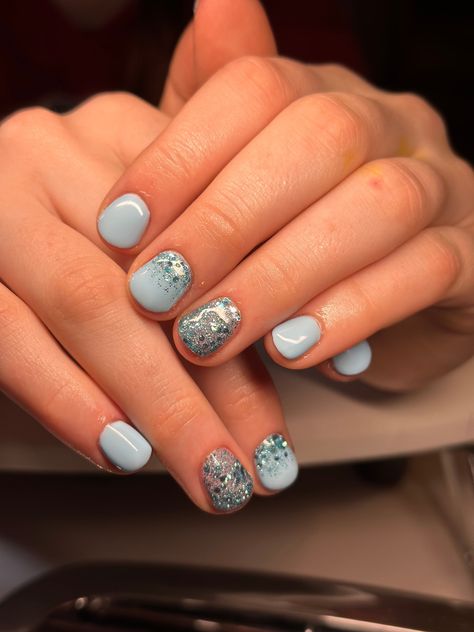 Soft sky blue creates a gentleserene look reminiscent of a cleartranquil afternoon sky. Super Short Natural Nail Designs, Blue Nail Gel Polish, Blue Gel Polish Nail Designs, Sparkle Light Blue Nails, Winter Shellac Nail Designs, Dusty Blue Gel Nails, Beach Shellac Nails, Short Acrylic Nails Small Nail Bed, Short Blue And Silver Nails