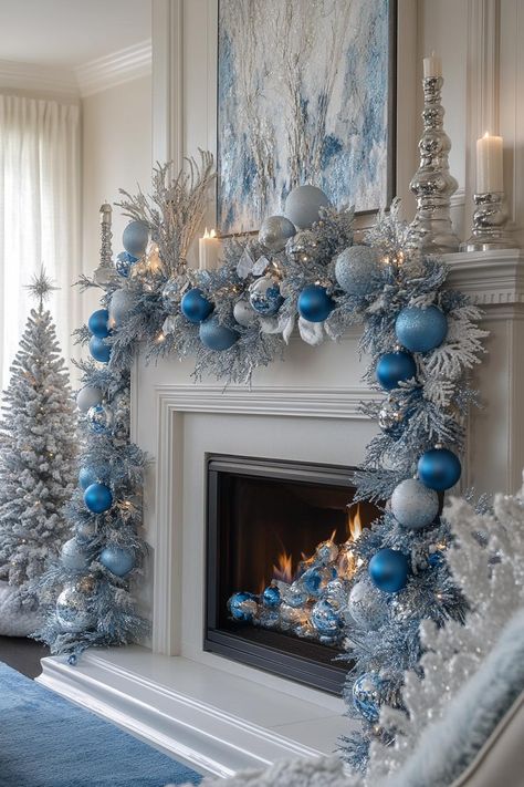 Blue Christmas decorations can transform your space into an enchanting winter paradise. Christmas Decor In Blue And Silver, Blue And White Fireplace, Light Blue And White Christmas Decor, Christmas Luxury Decor, Christmas Tree Ideas Light Blue, Blue Christmas Inspiration, Winter Wonderland Christmas Ideas, Winter Wonderland Ideas Decorations, Christmas Decor Ideas Winter Wonderland