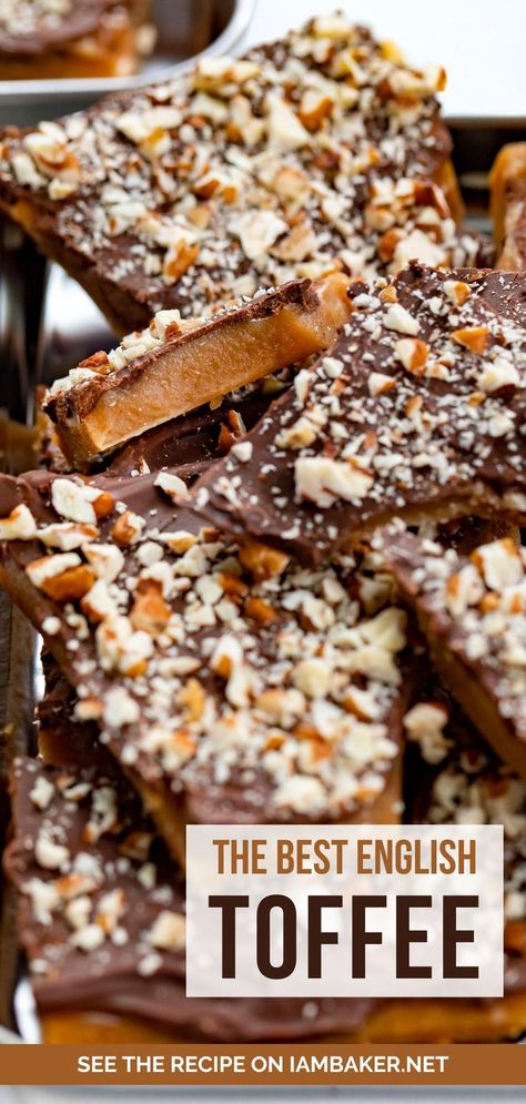 Pieces of chocolate and nut covered toffee in a tray and broken sporadically. Homemade English Toffee, English Toffee Recipe, Easy Candy Recipes, Homemade Toffee, Toffee Recipe, Christmas Baking Recipes, English Toffee, Candy Recipes Homemade, Christmas Candy Recipes