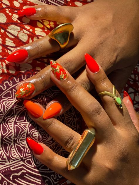 Deep Orange Nails Fall, Orange And Gold Foil Nails, Orange Nails With Gold Flakes, Red And Orange Nails Design, Orange Foil Nails, Red And Gold Foil Nails, Orange And Gold Nails Acrylic, Carnelian Nails, Orange Red Nails Design