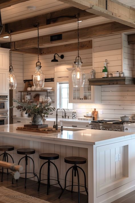 Learn how to add cozy lighting to your kitchen island, enhancing the rustic charm of your farmhouse kitchen. 🌟🍴 Cabin Interior Design Kitchen, Barndo Kitchen Ideas Farmhouse, Rustic Kitchen With Island, Farmhouse Living Room And Kitchen, Farm Kitchen Ideas Farmhouse Style, Cozy House Kitchen, Rustic House Farmhouse, White Farmhouse Interior, Rustic Country Kitchen Designs