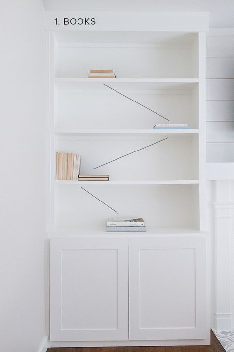 4 Steps to Style Your Bookshelves (+ what NOT to do!) - Michaela Noelle Designs How To Style A Built In Bookcase, Long White Shelves, Open Shelving Bookshelves, Styling A Built In Bookcase, How To Design Bookshelves, Trim For Built In Bookshelves, Built In Styling Bookshelves, How To Style Deep Shelves Built Ins, How To Style Office Bookshelves