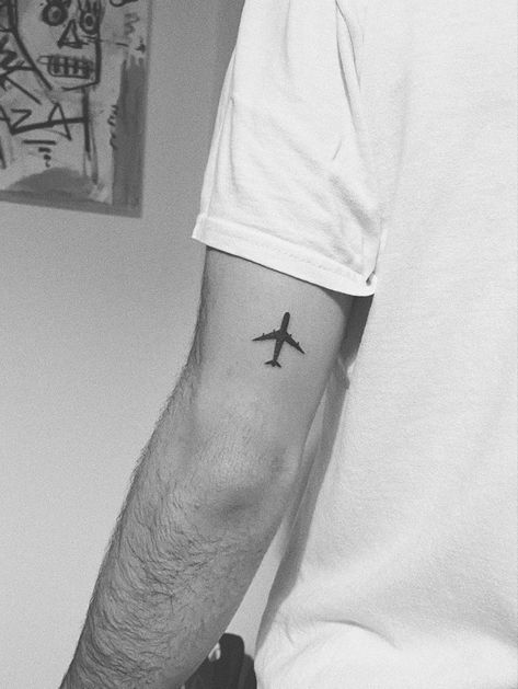 Traveller Tattoo Men, Aesthetic Mens Tattoo Ideas, Plane Tattoos For Men, Airplane Tattoos Men, Small Aviation Tattoo, Men’s Minimal Tattoo, Minimalist Plane Tattoo, Minimal Tatoos Idea Men, Simple Plane Tattoo