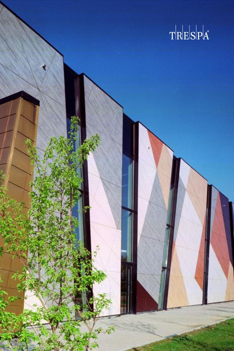 Louis Philibert High School in Le Puy-Sainte-Réparade, France. Exterior panels: Trespa® Meteon® NW01 Loft Grey, NW09 Wenge, NW12 Natural Bagenda, NW16 Milano Terra and NW20 Bleached Pine Finish: Satin Trespa® color collection: Wood Decors Application: Façades / Exterior Project segment: Education / High School Architect: Vieilliard et Fasciani Buildtype: New construction Fixing system: TS150_Visible (Exposed) Fixing Installer: Asten Spapa Group Year: 2013 School Facade, School Building Design Exterior, High Schools Exterior, School Exterior Design, High School Exterior Design, Modern School Exterior, High School Exterior, School Facade Design, School Exterior