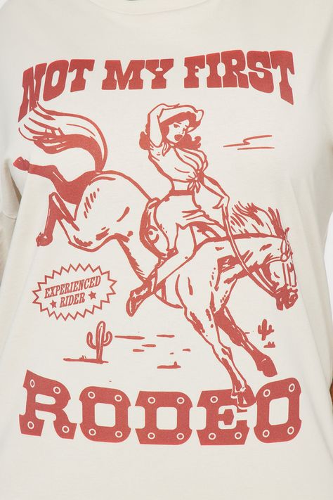 Available In Taupe. Crew Neck Short Sleeve Front Screen Stretch Disclaimer: Due To The Printing Process A Difference In Saturation May Occur. Each Garment Is Unique. 100% Cotton Imported | Not My First Rodeo Graphic Tee Shirt in Taupe size XL by Fashion Nova Rodeo Graphic Design, Cowboy Tshirt Designs, In My Era Shirt, Rodeo Sayings, Western Tee Shirts, Rodeo Tshirt, Western Shirts For Women, Not My First Rodeo, Taupe Fashion