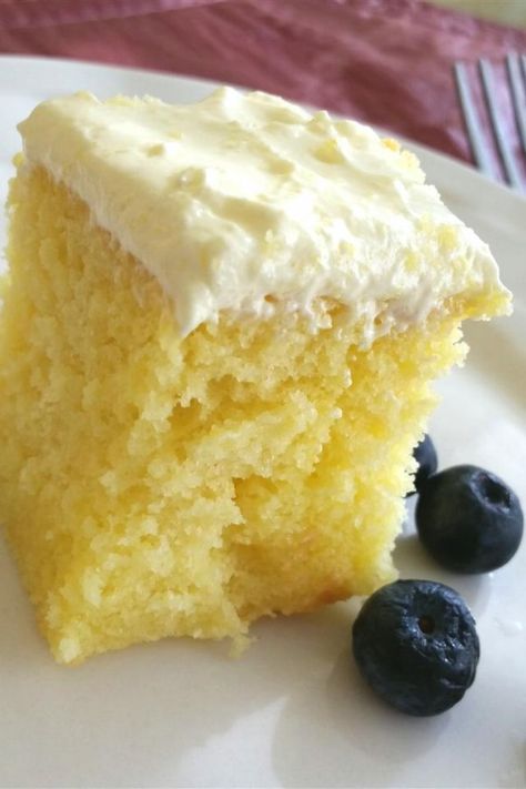 Lemon Cooler Cream Cake | "This was great! Cool, lemony, a snap to make. And, the best part, no expensive, exotic ingredients! This is a big hit at our house, both for family and company." #easter #easterrecipes #easterideas #easterinspiration #easterweekend #eastermeal #allrecipes Cooler Cake, Mandarin Orange Cake, Lemon Cake Mix Recipe, Lemon Cream Cake, Lemon Cake Mixes, Sheet Cakes, A Piece Of Cake, Pudding Cake, Cake Mix Recipes