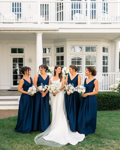 One last gorgeous summer hurrah on the harbor 🌊 Katherine’s bridesmaids wore our Navy Shantung Harper dress with the Dahlia skirt to create an especially elegant look, fitting for such a timeless celebration. Classic brides, save this one for bridal party/all-white bouquet/invitation suite inspiration! Congratulations to the newlyweds, Katherine and Jack! 🥂 Planning @elsilueventplanning Photography @jessicavandermarelphoto Videography erickdavid.films Florals @florarae_ Hair @balayage_bybroo... Navy Blue Bridal Party Color Combos, Navy Blue Bridal Party, Navy Bridal Party, Navy Bridesmaids Dresses, Navy Bridal Parties, Brides Maid Dresses Blue, Navy White Wedding, Dark Blue Bridesmaid Dresses, Navy Bridesmaid Dress