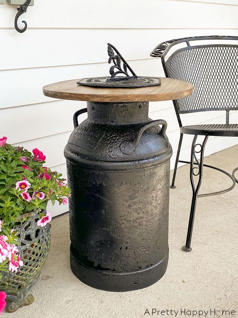 Turn a vintage milk can into a side table with a round wood top. Milk Can Decor, Old Milk Cans, Vintage Milk Can, Funky Junk Interiors, Garden Decor Diy, Funky Decor, Vintage Garden Decor, Front Porch Decorating, Funky Junk