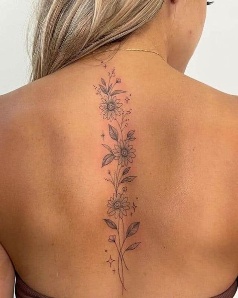 20 Unique And Meaningful Back Tattoos For Women Meaningful Back Tattoos, Back Tattoos For Women, Feminine Back Tattoos, Floral Back Tattoos, Flower Spine Tattoos, Tattoos For Women Flowers, Petite Tattoos, Spine Tattoos For Women, Classy Tattoos