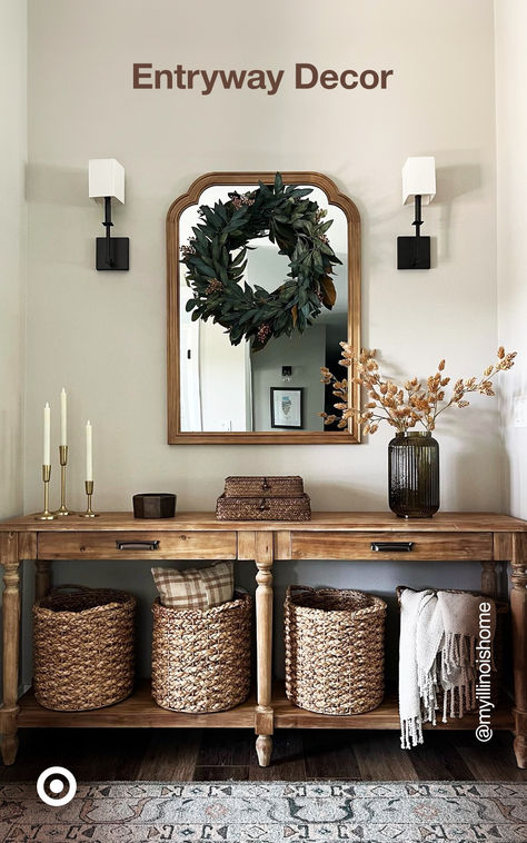 Maximize your entryway space with a small hallway table, curved mirror & decor that blends style and practicality. P.S. Use woven baskets that double as accents & organizers. Black With Light Wood Decor, Entry Table Styling Traditional, Arch Mirror Entryway Table, 60 Inch Entry Table, Small Wall Nook Decorating Ideas, Small Entry Table With Mirror, Entryway Table Storage Ideas, Entryway Table Decor With Pictures, Hallway Stand Decor