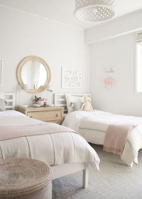 Are you looking to design a shared bedroom for your darling girls? We've rounded up the prettiest shared girls rooms for you. White Twin Bed Girls Room, Spare Bedroom With Twin Beds, 2 Bed 1 Room Ideas, White Childrens Bedroom, White Twin Bedroom Ideas, 2 Twins In One Room, 2 Beds Girls Room, Room Ideas For Two Beds, Two Girls Bedroom Designs