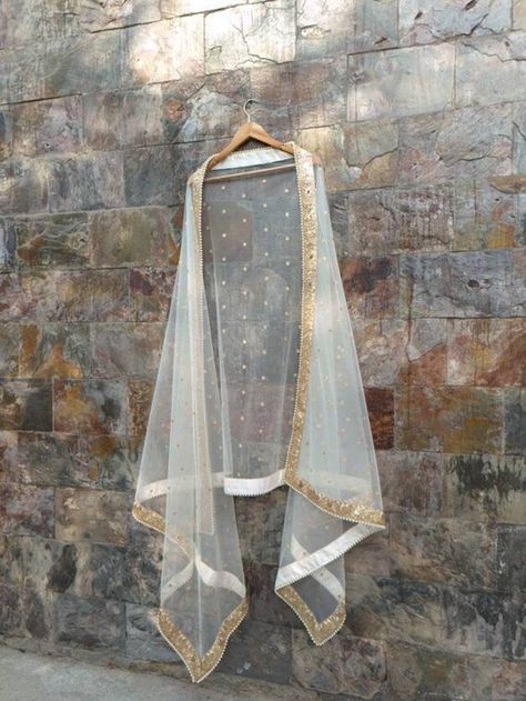 Check out this item in my Etsy shop https://www.etsy.com/in-en/listing/1461067632/ivory-net-dupatta-bridal-dupatta Gold Dupatta, Dupatta Bridal, White Dupatta, Wedding Shawls, Indian Wedding Lehenga, Bridal Dupatta, Anarkali Lehenga, Wedding Sari, Wedding Sherwani