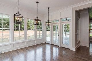 Southern Living farmhouse revival plan no. 1821 Black and White Farmhouse by Garmen Olivia | by plexuschic Main Floor Flooring Ideas, Farmhouse Revival, Orangery Ideas, Sunroom Interior, Farmhouse Sunroom, Sunroom Windows, Orangery Extension, Glass Porch, Crab House