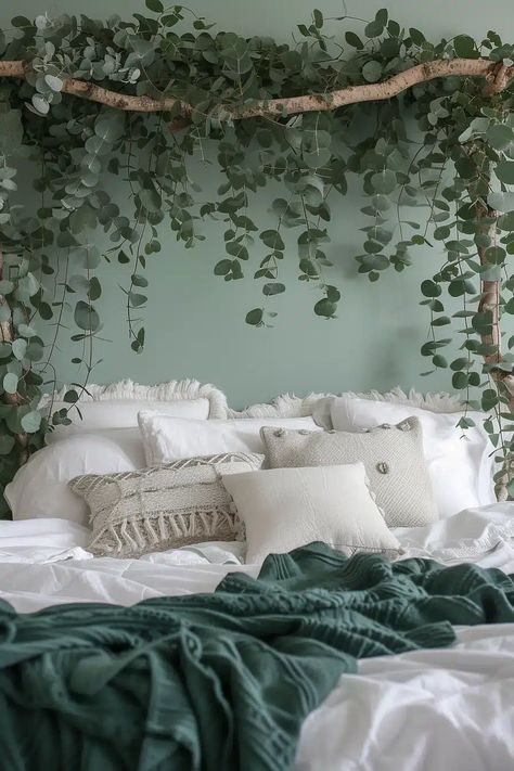 If you're looking to add a touch of greenery to your bedroom, then you'll want to take a look at these 25 botanical bedroom ideas. These tips will show you how to artfully incorporate plants into your sleeping space, use wallpaper to bring the outside indoors, and more. Here are 24 Botanical Bedroom Ideas to Decorate with Greenery. Cute Plant Bedroom Ideas, Behind Bed Decor Ideas, Leafy Bedroom Ideas, Woodland Bedroom Aesthetic, Space Above Bed Ideas, Greenery In Bedroom, Leaf Lights Bedroom, Bedroom Greenery, Ivy Bedroom Wall