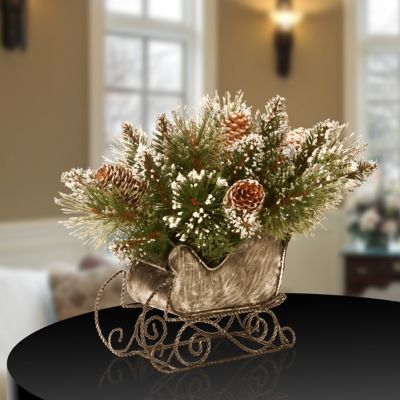 10 in. Glittery Bristle Pine Sleigh | Ashley Furniture HomeStore Christmas Candle Decorations Ideas, Shell Flowers, Winter Decorating, Christmas Candle Decorations, Fire Places, Christmas Flower Arrangements, Christmas Floral Arrangements, Christmas Centerpieces Diy, Christmas Sleigh