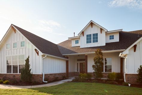 Brick And Siding Garage, Three Over One Windows Exterior, Red Brick White Board And Batten, Red Brick With White Siding, White Siding Exterior, Grey House White Trim, Vertical Siding Exterior, White Board And Batten, Hunter House