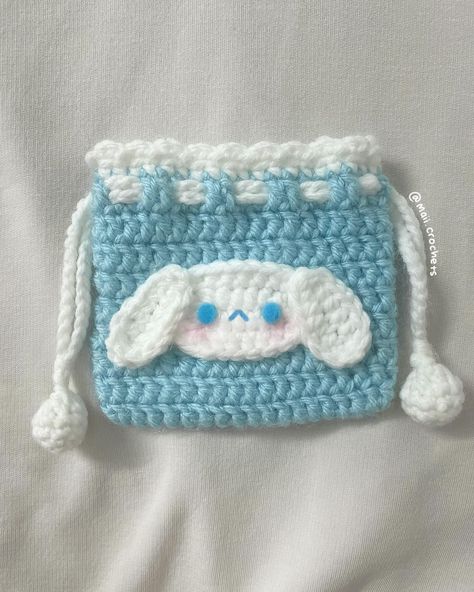 ૮꒰ ˶• ༝ •˶꒱ა ♡ my cinnamoroll pouch test for @kwochet.studio 🩵Here’s my test for the lovely @kwochet.studio’s cinnamoroll mini drawstring bag! Making this pouch is an absolute must! ( I made it for my sister to store her little trinkets😋) It is so cute and easy to make so go check it out now!!!!!😸 /)/) ( . .) ( づ♡ ᯓ ᡣ𐭩 pattern by: @kwochet.studio ˚₊· ͟͟͞➳❥ #crochet #crochetlove #crochetersofinstagram #crocheter #crochetbunny #crochetinspiration #crocheting #crochetplushie #crochetamig... Cute Crochet Drawstring Bag, Cinnamoroll Crochet Pattern Free, Mini Crochet Pouch, Cute Crochet Bag Ideas, Crochet Pouch Ideas, Cinnamoroll Crochet Pattern, Cinnamon Roll Crochet, How To Crochet A Bag, Crochet Little Bag