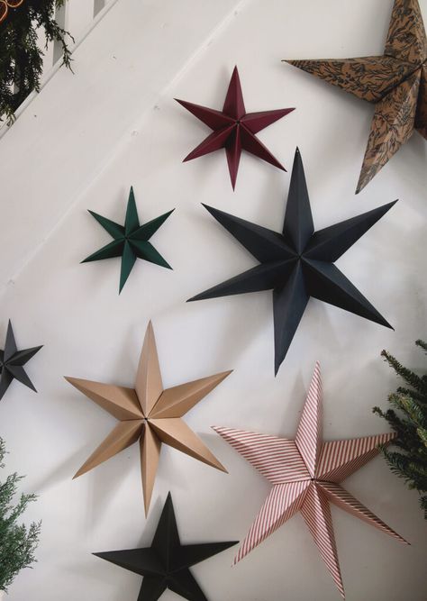 Learn how to make these easy 3D paper stars! Just a few supplies needed and you can have beautiful paper stars to decorate with in a few minutes! #diy #crafts #paperstars Recycled Paper Christmas Decorations, Kids Paper Ornament Craft, Paper Stars Diy Easy 3d Snowflakes, How To Make A 3d Paper Star, German Paper Stars How To Make, 3d Paper Christmas Decorations, Stars Out Of Paper Bags, 3d Paper Star Template, Star Of Paper