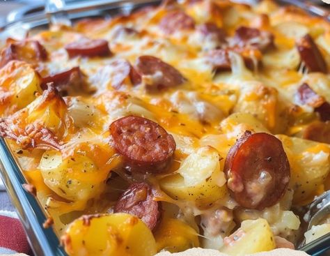 cheesy potato & smoked sausage casserole - Scalloped Potatoes And Sausage Casserole, Cheesy Potatoes And Smoked Sausage, Cheesy Potato And Sausage Casserole, Smoked Sausage And Potatoes In Oven, Smoker Casserole Recipes, Italian Sausage Potato Casserole, Cheesy Kielbasa And Potatoes, Polish Sausage Casserole, Cheesy Potato Sausage Casserole