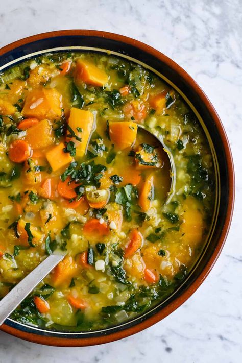 This immune boosting butternut squash vegetable soup has a variety of tastes and textures guaranteed to strengthen your body from the inside out. It's a hearty soup made with creamy butternut squash, antioxidant rich cauliflower rice and nutrient dense kale but completely grain and gluten free. Herbs and spices enhance the flavor of the vegetables and boost your overall health. Butternut Squash Stew, Butternut Squash Sweet, Butternut Squash Kale, Butternut Squash Soup Recipe, Fasting Recipes, Creamy Butternut Squash, Butternut Soup, Hearty Vegetable Soup, Squash Vegetable