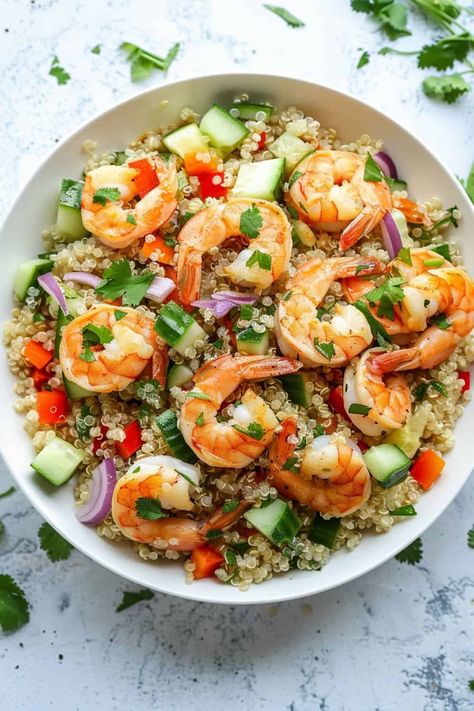 A vibrant shrimp and quinoa bowl featuring juicy shrimp, fresh vegetables, and a zesty cilantro lime dressing for a healthy, flavorful meal. Shrimp Quinoa Bowl, Honey Fried Chicken, Fried Chicken Recipe Southern, Summer Picnic Food, Shrimp And Quinoa, Quick Family Dinners, Picnic Recipes, Shrimp And Asparagus, Butter Shrimp