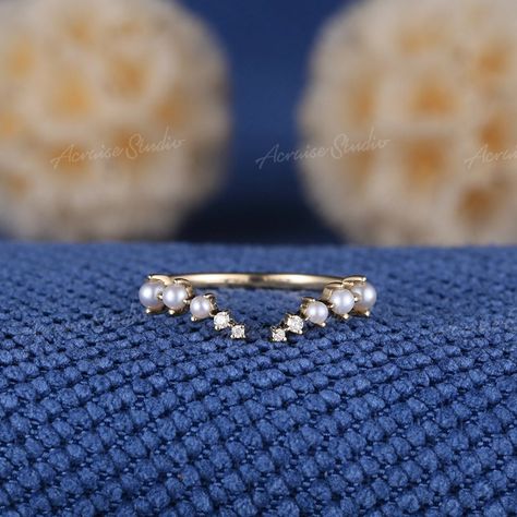 This Wedding Bands item by acraisejewelry has 989 favorites from Etsy shoppers. Ships from San Francisco, CA. Listed on May 14, 2024 Wedding Band With Different Shaped Diamonds, Diamond Ring With Pearl Band, Wedding Band Shapes, Pearl Wedding Band Stack, Ethereal Wedding Band, Gold Pearl Wedding Band, Pearl Ring Band, Open Rings Design, Wedding Bands With Pearls