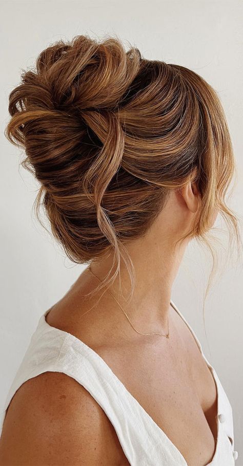 chic updos, updos, updo hairstyle, cute updo, simple updo, chignon, high updo Low Bun Wedding Hair Brunette Messy Updo, Loose Chignon Updo, Messy Updo For Wedding, Loose High Updo Wedding, Tousled High Bun, High Messy Bridal Updo, Updo Hair Wedding Guest, Wedding Reception Updo, Strapless Wedding Dress Updo