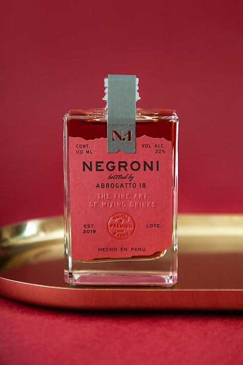 Negroni Abrogatto 18 packaging | Communication Arts Drinks Packaging Design, Bottle Design Packaging, Alcohol Packaging, Drinks Brands, Cool Packaging, Wine Packaging, Premium Packaging, Packaging Labels Design, Beverage Packaging