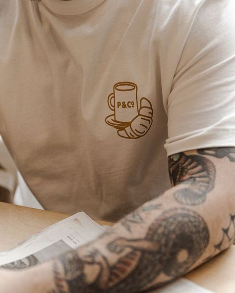 Coffee & Croissants T-Shirt - Off White - XS / Off White / Graphic T shirt #tshirt t-shirt #t_shirt t shirts #tshirts t-shirts #t_shirts T shirt design #tshirtdesign T-shirt designs #t_shirtdesign T shirts designs #tshirtsdesigns 4.342 Cafe T Shirt Design, Cafe Shirt Design, Cafe Tshirt Design, Coffee Merchandise Ideas, Coffee Shop Tshirt Design, Coffee Shop T Shirt, Coffee Tshirt Ideas, Coffee Shop Tshirt, Graphic T-shirt Design