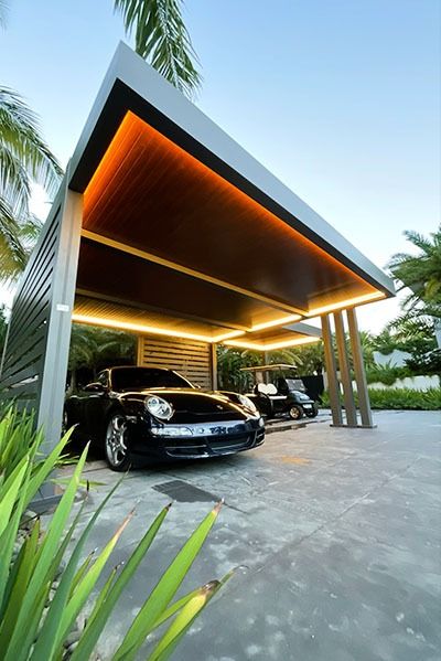 The R-Car carport is the perfect solution for residents looking to protect their vehicles from the heat, rain or snow. Small Car Porch Design, Driveway Car Cover Ideas, Hidden House Features, Modern Parking Design, Parking Roof Design, Car Shades Parking Ideas, Canopy Carport Design, Car Porch Design Modern, Modern Carport Designs