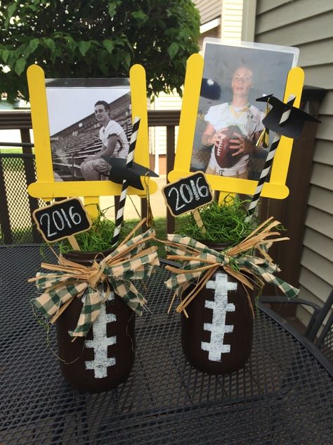 Football center piece for High School Graduation.  Used Mason Jars and laminated pictures and inserted in field goal.. Football Centerpieces, Football Banquet, Football Crafts, Senior Football, Football Theme Party, Football Birthday Party, Football Decorations, Football Themes, Football Birthday