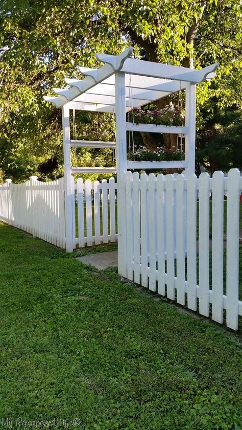 It was a big job but my white picket fence is done. This fence is totally DIY, no panels, each board cut individually and it turned out perfect. #MyRepurposedLife #outdoor #picketfence Privacy Landscaping, Patio Pergola, Small Front Yard, Pergola Design, Diy Fence, Garden Arbor, Front Yard Fence, White Picket Fence, Wooden Pergola