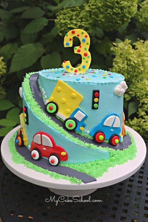 Car and Truck Cake Tutorial! This sweet spiral cake design is a free cake video tutorial by My Cake School! #carcake #truckcake #carandtruckcake #trafficcake… Cars Cake Design, Amazing Cake Decorating, Rodjendanske Torte, Cake Designs For Boy, Truck Birthday Cakes, Cake Designs For Kids, Baby Boy Birthday Cake, Cars Birthday Cake, Truck Cake