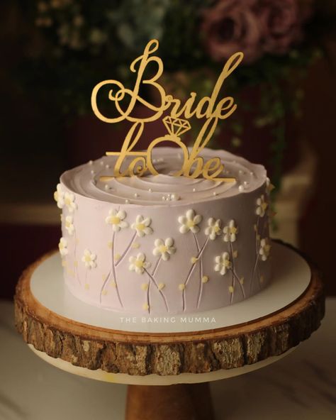 Whimsical lilac with a touch of daisy magic 🌸💜 Celebrating the beautiful bride-to-be with a cake as dreamy as her big day! #Bridetobe #LilacLove #DaisyDreams #WeddingVibes #BakingWithLove Bride Cake Ideas, Bride To Be Cake Design, Bride To Be Cakes Ideas, Bride To Be Ideas, Bride To Be Decoration Ideas, Miss To Mrs Cake, Whimsical Cakes, Bride To Be Cake, Bride To Be Decorations