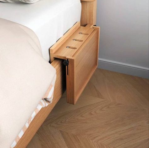 Its wooden construction matches the bed, creating a harmonious look. I love how you can fold it up when you’re not using it, so you’ve got more room to move around! Image credit: INSTAGRAM @OUTOFDECOR Bed Attached Side Table, One Side Bedside Table, Bedroom With Side Tables, Fold Down Bedside Table, Fold Out Bedside Table, Clip On Bedside Table, Folding Bedside Table, Space Saving Bedside Table, Bed Without Side Tables