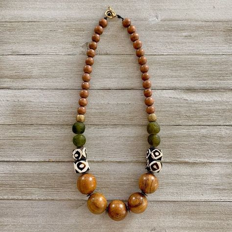 Nicole Camille Designs on Instagram: “Ubunifu Necklace - Another gorgeous necklace that features Batik bone beads! These "Eye Batik" Kenyan bone beads are handcrafted by…” Wood Necklace Ideas, Wooden Beaded Necklace, Wooden Beads Necklace, Necklace Ideas Beads, Wooden Beads Jewelry, Wooden Bead Jewelry, Wood Beads Jewelry, African Beads Necklace, Handmade Boho Jewelry