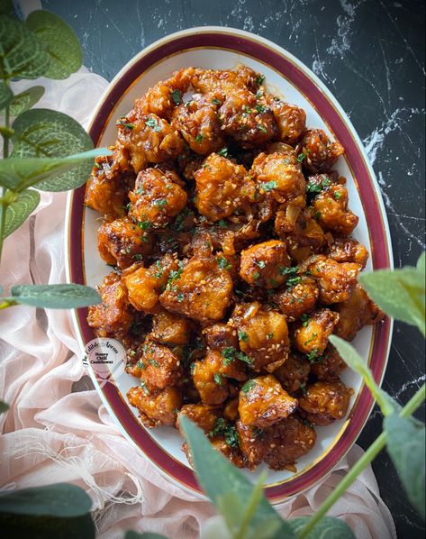 Honey Chilli Cauliflower is an Indo-Chinese recipe, wherein the cauliflower florets are deep fried coated with batter and later dipped in sauces. Sesame seeds and honey is the most drooling part of this dish. This can be dry or semi gravy, it’s upto each ones preference. Honey Chilli Cauliflower, Gobhi Recipe, Indo Chinese Recipes, Chinese Recipe, Sesame Seeds, Deep Fried, Chinese Food, Gravy, Meatballs