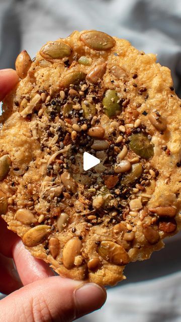 Go Raw on Instagram: "These crispy cheese & seed crackers are a super savory, high protein snack that you can make in 15 minutes. Make them vegan by swapping in a plant-based shredded cheese 🌱 Get the recipe below!

Crispy Cheese & Seed Crackers

Ingredients:
2 cups of grated asiago cheese, or vegan alternative
½ cup of Go Raw Super Simple Sprouted Seeds Salad Toppers
1 tbsp chia seeds
1 tbsp chia seeds
1 tsp everything bagel spice
pinch of salt

Steps:
1. Preheat oven to 375°F. Add clumps of asiago, about a tablespoon each, to a parchment-lined baking sheet until you have used most of the cheese. Sprinkle on the Super Simple Sprouted Seeds, chia seeds, and everything bagel spice. Finish with a small sprinkling of asiago to hold everything together.
2. Bake for 8-10 minutes, until seed cr Savory Protein Snacks, Seed Crackers Recipe, Sprouted Seeds, Healthy Crackers, Seed Crackers, High Protein Snack, Salad Toppers, Crispy Cheese, Protein Snack