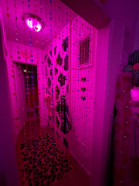 colorful neon apartment with beaded door curtain and cow print doors Pink Lighting Bedroom, Led Lights House Aesthetic, Retro House Ideas, Party Room Design, Vibey Kitchen Aesthetic, All Pink Apartment, Led House Aesthetic, Trippy Apartment Aesthetic, Baddie Home Decor