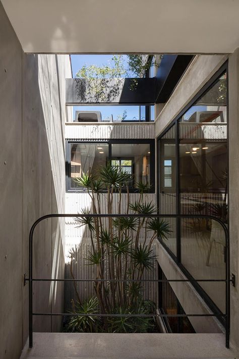 corrugated concrete towers + verdant patios form student housing by a-001 in mexico Modern Student Housing, Student Housing Architecture, Corrugated Concrete, Vertical House, Student Residence, Houses In Mexico, Student Housing, Student House, Minimal House Design