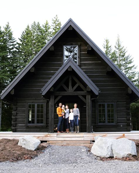 Black log cabin exterior - modern cottage design Cottage Design Exterior, Black Log Cabin Exterior, Modern Log Cabins Exterior, Log Cabins Exterior, Cabins Exterior, Modern Cottage Design, Black Log Cabin, Cabin Exterior Colors, Modern Log Home