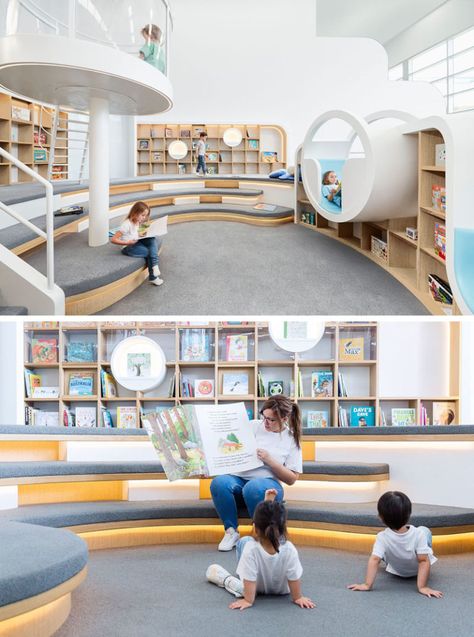 This quiet room at a children's play center has a with a library of books, where the children can sit and read by themselves, or with an adult. Tiered seating and various reading nooks create unique spaces for reading and storytelling. Children Library Design, Playground Inside, Library Seating Area, Moon Walking, Library Seating, School Library Design, Kindergarten Interior, Tiered Seating, Children's Library