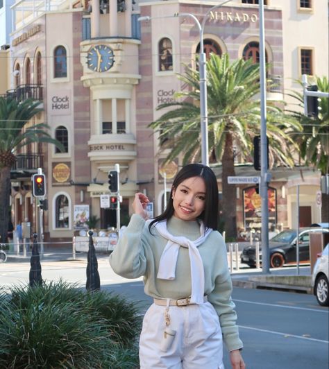 Old money outfit, old money aesthetic, old money fit, pastel outfit, white pants, pastel green, jumper around the neck, Asian, Filipino, black hair, elegant photo, casual elegant, tourist photo, Gold Coast, Australia, Queensland, Old Money Outfits Pastel, Asian Old Money Outfits, Old Money Pastel Outfits, Old Money Green Outfit, Green Old Money Outfit, Asian Old Money Aesthetic, Pastel Green Outfit, Asian Old Money, Old Money Aesthetic Green Outfit