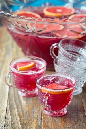 New Years Eve Champagne Punch #newyear #punch Sangria In Punch Bowl, Champagne Punch Bowl, Christmas Cocktails Punch Bowl, Sangria Punch Bowl, Christmas Cocktail Punch Bowl, Punch Bowl Recipes Alcohol, Punch Bowl Drinks Alcohol, Punch Bowl Cocktail Recipes, Haunted Academia