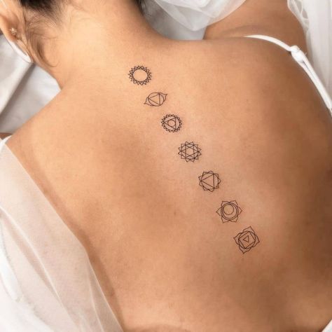 Young Talent Expresses His Artistic Side Through Minimalist Tattoos Chakras On Back Tattoo, Chakra Line Tattoo, Tattoo Ideas Female Chakra, Dainty Chakra Tattoo, Fine Line Chakra Tattoo, Chakra Tattoo Minimalist, Yoga Fine Line Tattoo, Minimalist Chakra Tattoo, Chakra Lotus Tattoo