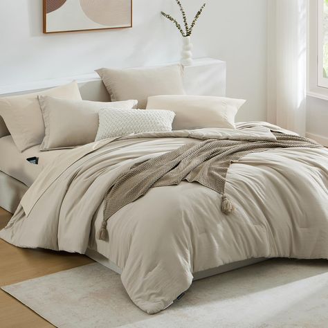 PRICES MAY VARY. 【Exquisite & Minimalist & Fashion】WRENSONGE comforter and sheets adopt a contrasting color design, more unique. Simple solid color appearance with fashionable colors. Our king comforter set can easily be paired with any style of bedroom. Adding some relaxed and warm atmosphere to your bedroom. 【7 Pieces King Size Comforter Set with Sheets】1 King Comforter 102" x 90", 2 Pillow Shams 20" x 36", 1 King Fitted Sheet 78" W x 80" L +14"（There is a fitted pocket for easy storage）, 1 Ki Comforters For Couples, White And Oatmeal Bedding, Farmhouse Bedroom Comforter Sets, Oatmeal Colored Bedding, Amazon Comforter Sets, Neutral King Bedding Ideas, Taupe Comforter Bedroom Ideas, Down Comforter Bedding Ideas, Bedding For Grey Headboard