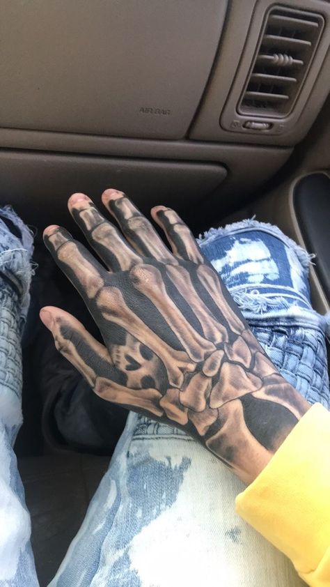 Hand Tat Ideas Men, Hand Tattoos Ideas For Men, Hand Tattoos For Guys Skeleton, Arm And Hand Tattoos Men, Trap Tattoos Men Hand, Hand Tattoos Men Ideas, Black Hand Tattoos Men, Skeleton Tattoo Hand Men, Hand Tattoo Designs Men Ideas