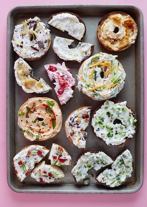 Plain cream cheese is delicious, but why not get a little creative with your breakfast or lunch bagel toppings? Here we have 11 recipes to turn plain cream cheese into a schmear you'll love. We're not just talking about run-of-the-mill cream cheese flavors like scallion or strawberry — these 11 unique mix ins start with pumpkin, progress to pickle, and close with chocolate. These are schmears to kvell over. Flavored Cream Cheese Recipes, Cream Cheese Flavors, Flavored Cream Cheese, Cream Cheese Spread Recipes, Bagel Spread, Vegan Board, Cheese Spread Recipes, Flavored Cream Cheeses, Bagel Bar